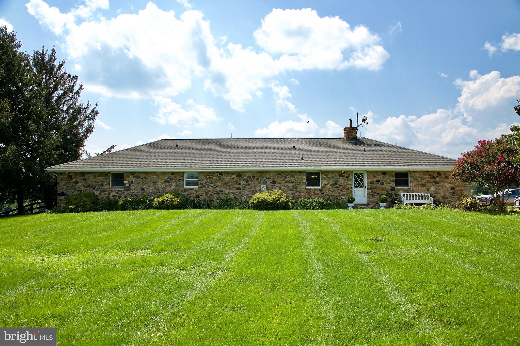 a view of a house with a garden