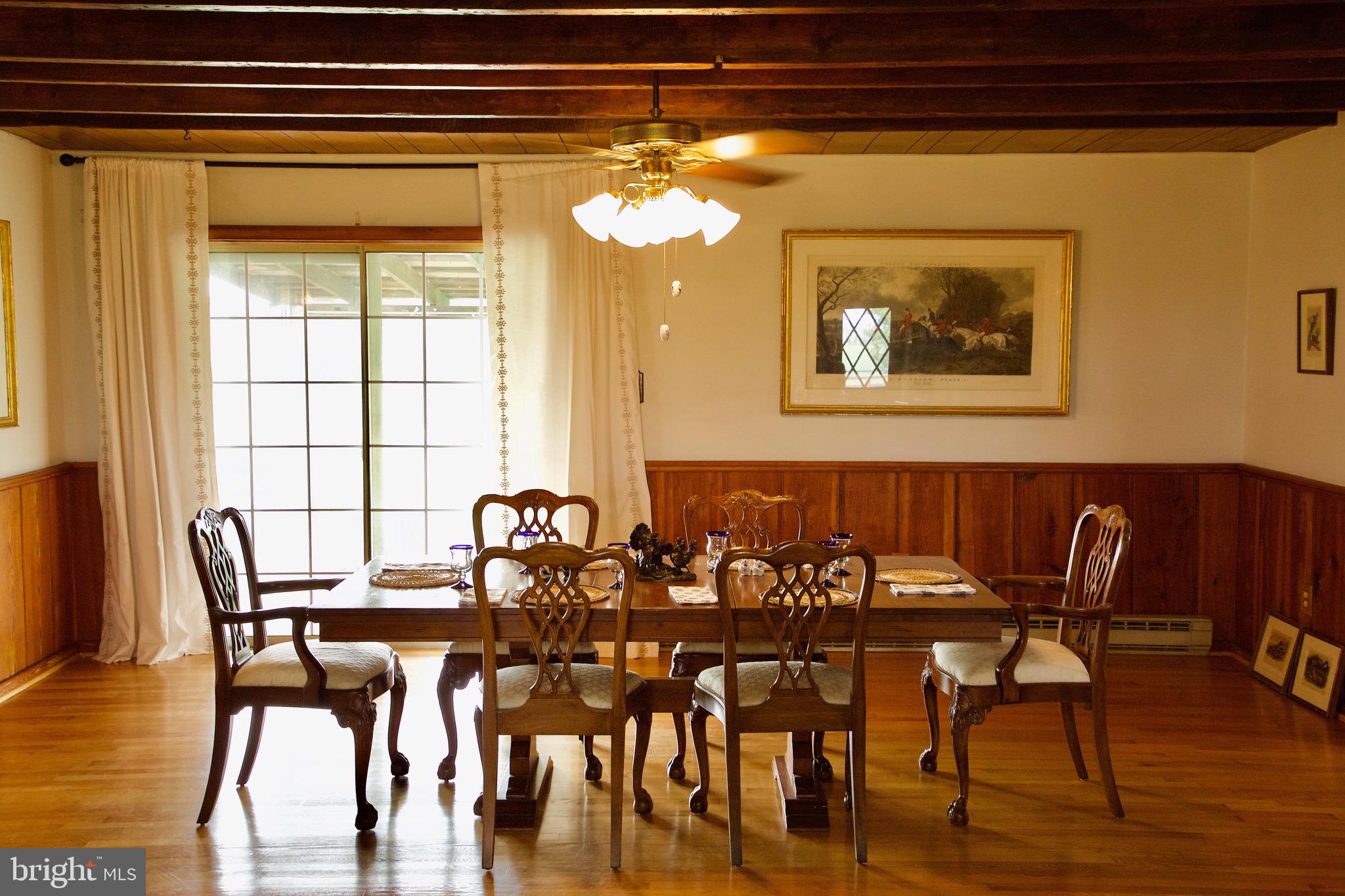 21133 Foxcroft Road Middleburg, VA 20117 - Photo 5 of 41 a view of a dining room with furniture and wooden floor