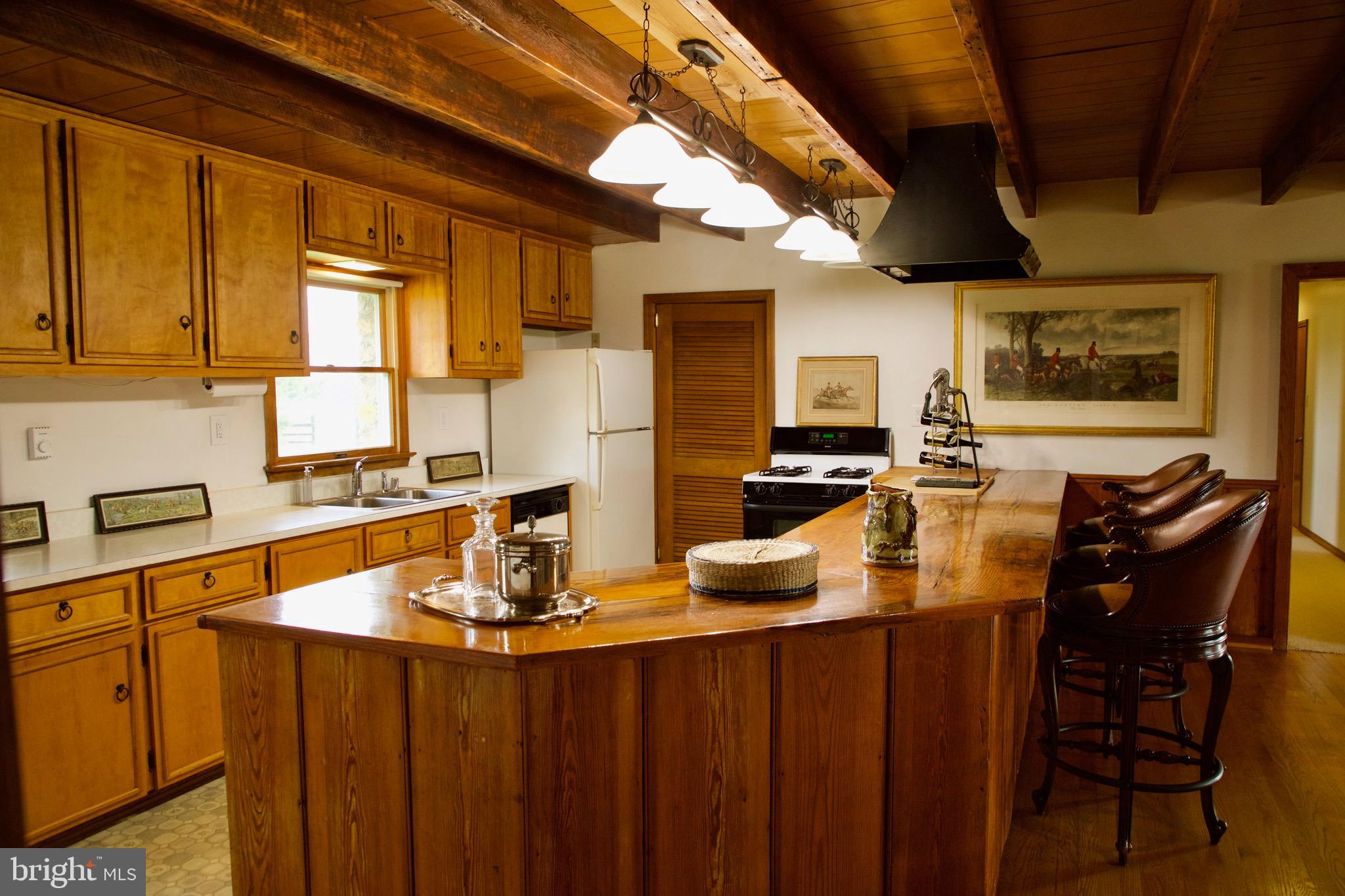 21133 Foxcroft Road Middleburg, VA 20117 - Photo 6 of 41 a kitchen with a sink appliances and cabinets