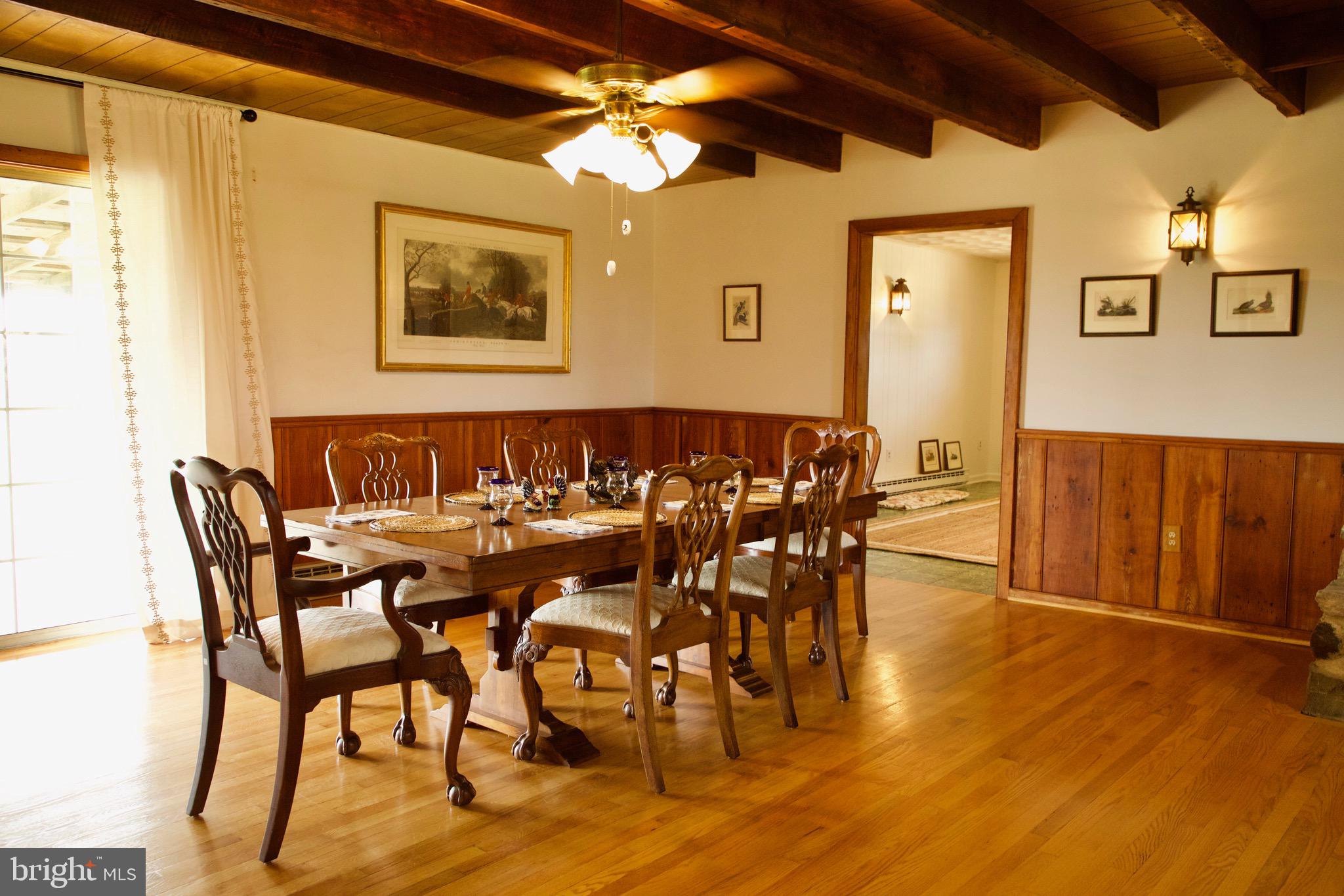 21133 Foxcroft Road Middleburg, VA 20117 - Photo 9 of 41 a view of a dining room with furniture and wooden floor