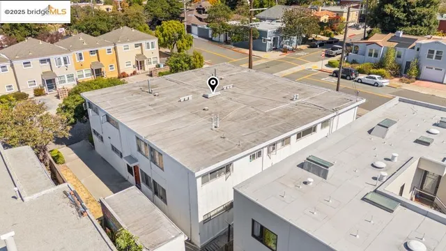 an aerial view of a house with swimming pool