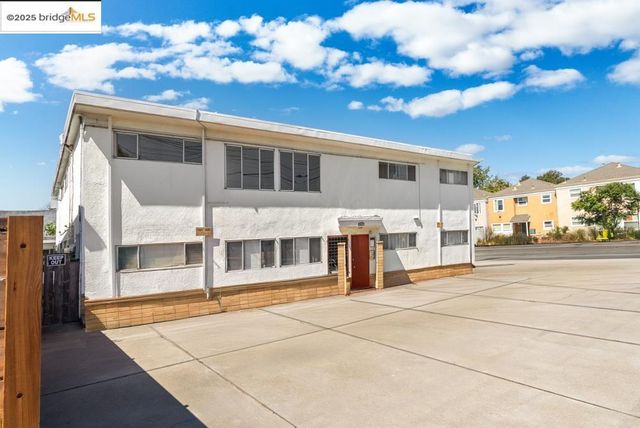 a view of a building with a street