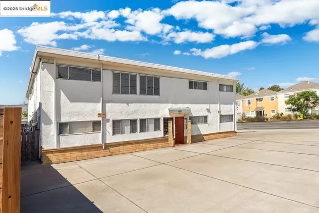 a view of a building with a street