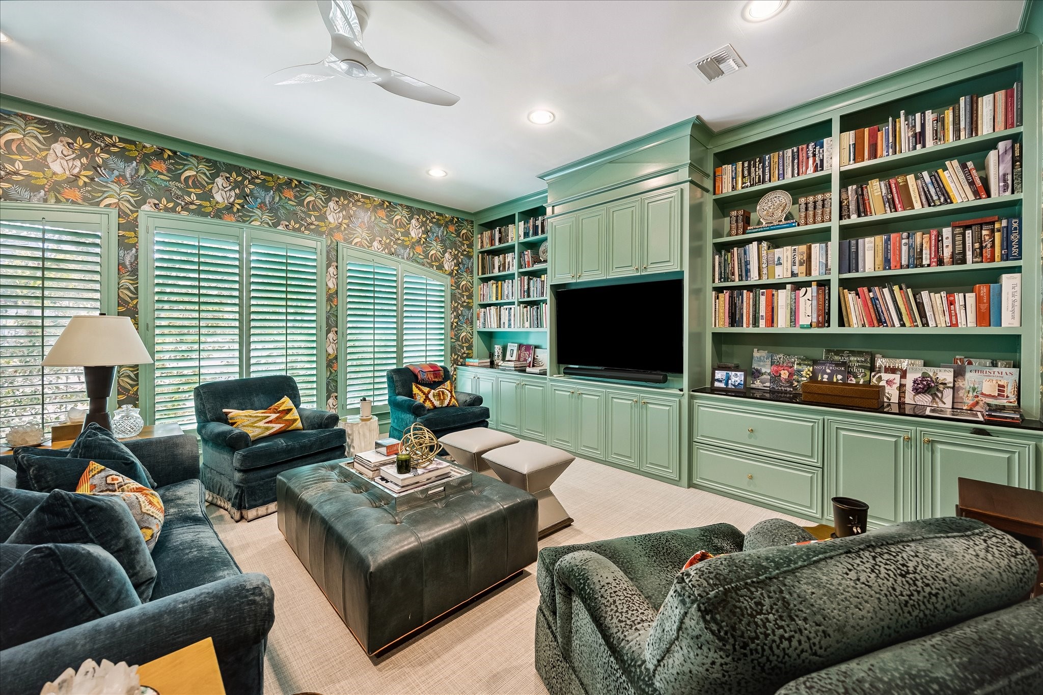 3 Exbury Way Houston, TX 77056 - Photo 21 of 41 a living room with furniture and a flat screen tv