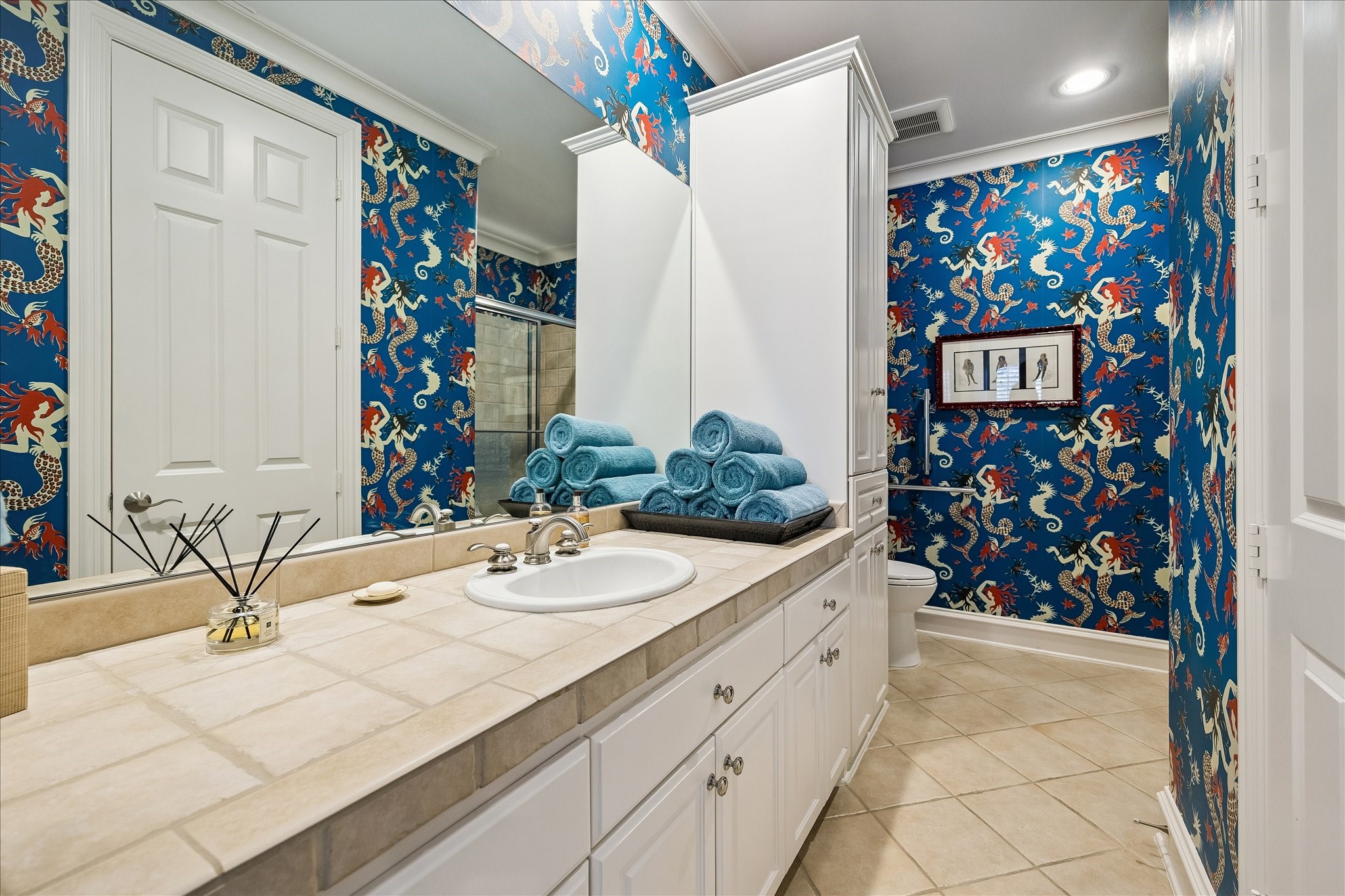 3 Exbury Way Houston, TX 77056 - Photo 24 of 41 a bathroom with a sink and a mirror