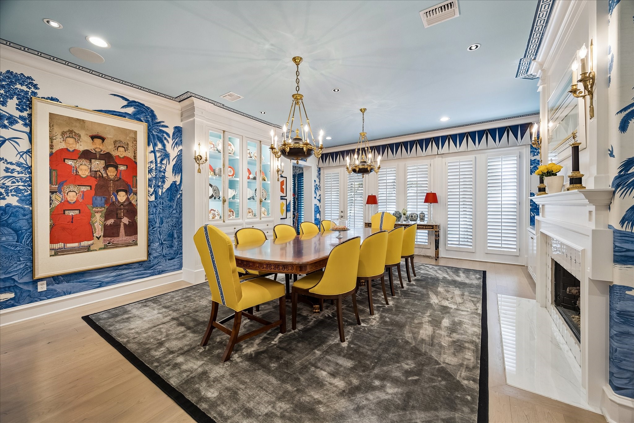 3 Exbury Way Houston, TX 77056 - Photo 5 of 41 a view of a dining room with furniture a fire place and chandelier