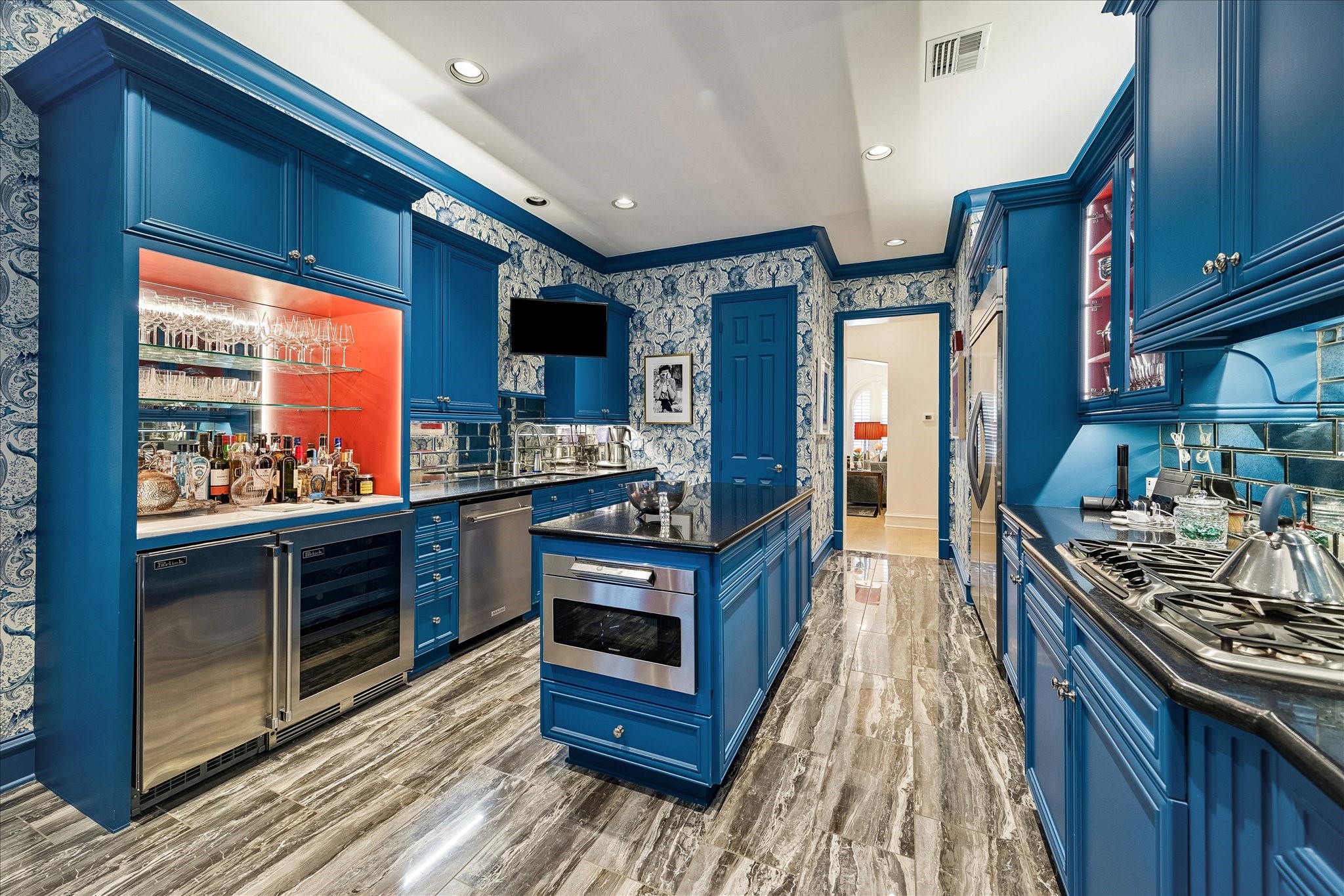 3 Exbury Way Houston, TX 77056 - Photo 8 of 41 a kitchen with stainless steel appliances granite countertop a stove top oven a sink dishwasher a refrigerator and cabinets with wooden floor