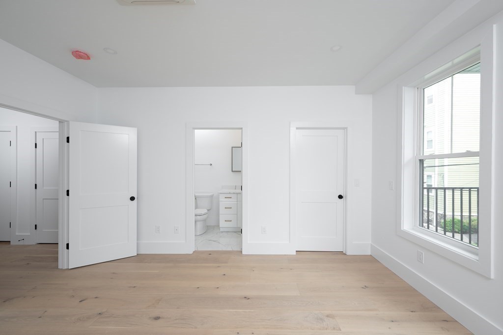 9 Greenmount Street, Unit 2 Boston, MA 02125 - Photo 7 of 15 a view of an empty room with a window