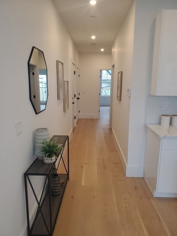 9 Greenmount Street, Unit 2 Boston, MA 02125 - Photo 9 of 15 a view of entryway with livingroom and furniture