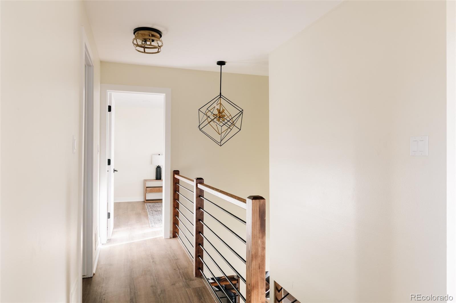 7580 South Lost Ranger Peak Littleton, CO 80127 - Photo 18 of 34 a view of a hallway with workspace