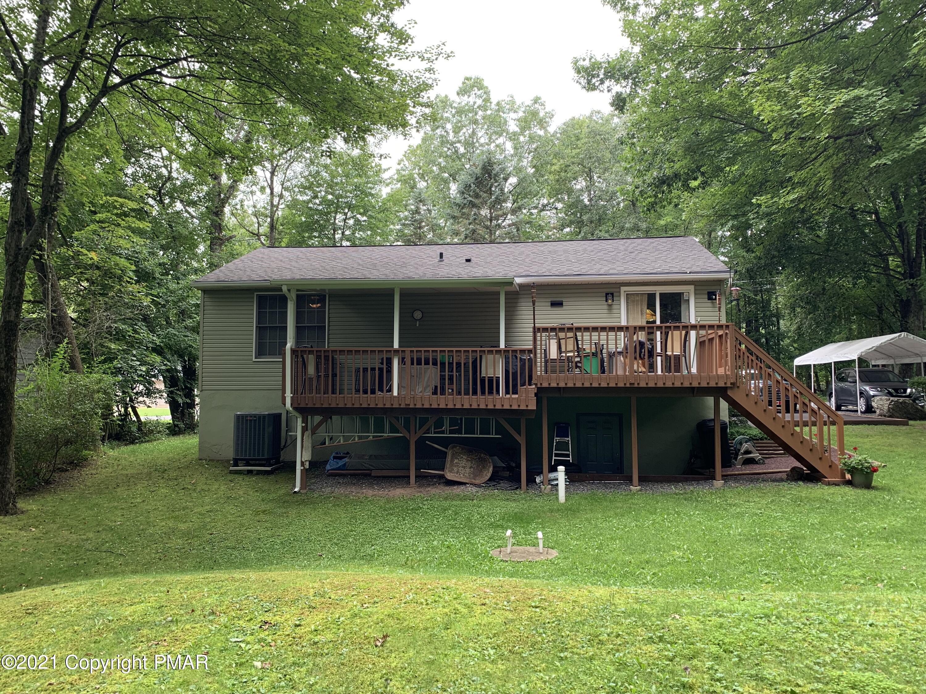 338 Laurel Lake Road Bartonsville, PA 18321 - Photo 11 of 27 a view of house with yard and entertaining space