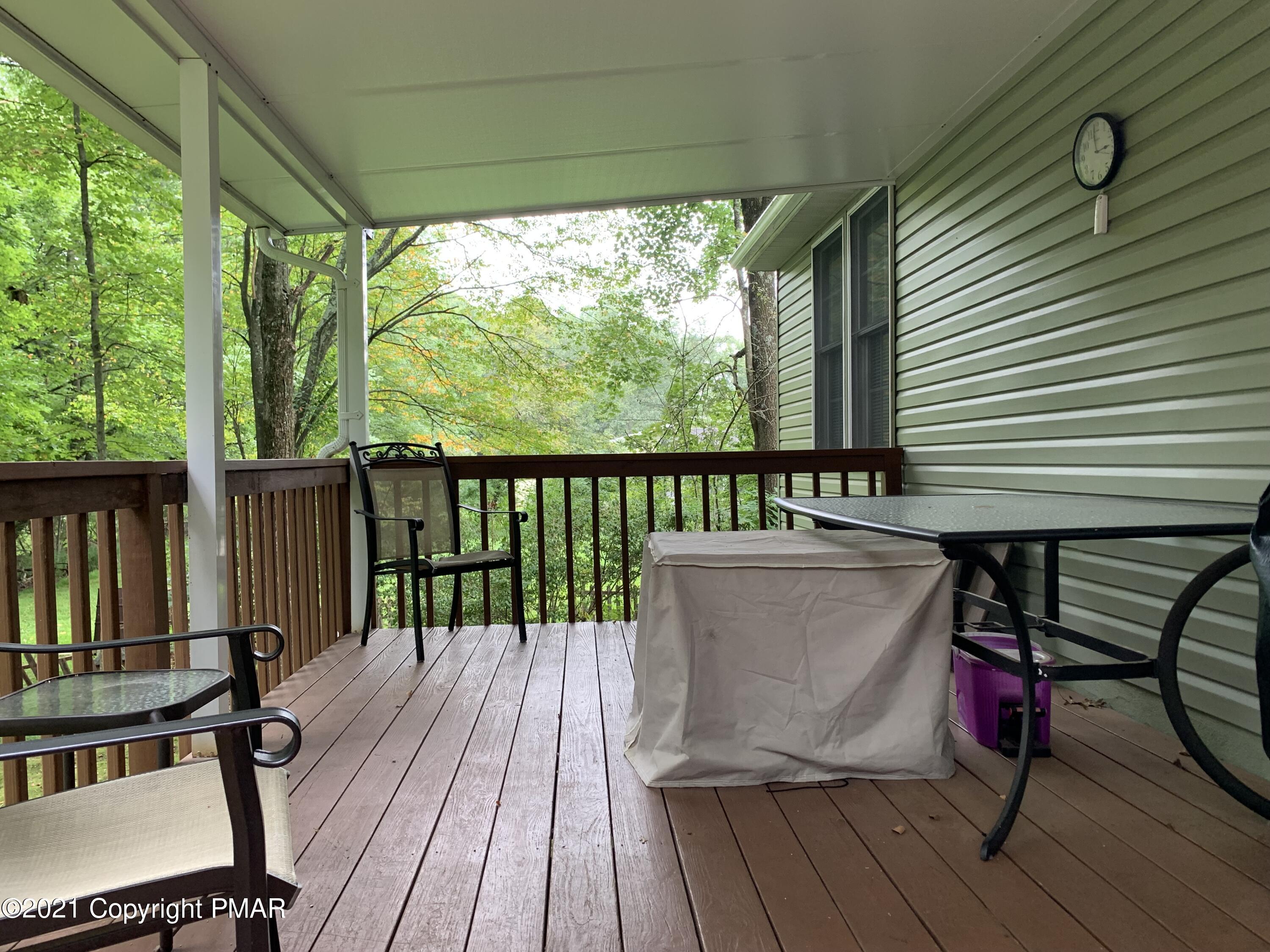 338 Laurel Lake Road Bartonsville, PA 18321 - Photo 14 of 27 a view of a chairs on the roof deck