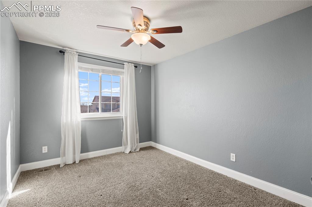 7672 Bullet Road Peyton, CO 80831 - Photo 34 of 50 Upstairs Bedroom 2