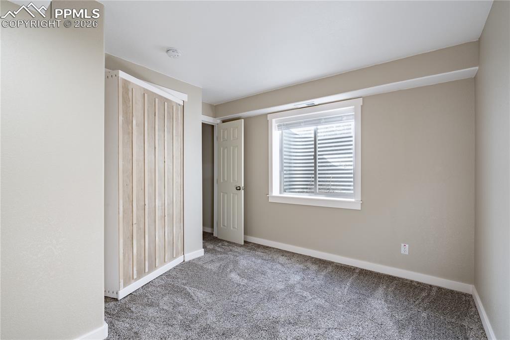 7672 Bullet Road Peyton, CO 80831 - Photo 42 of 50 Basement Bedroom 2
