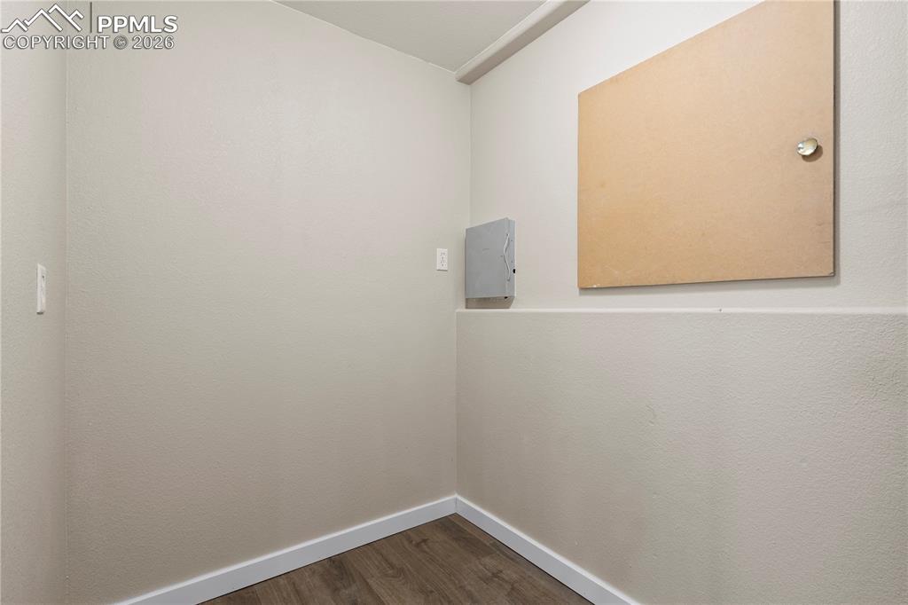 7672 Bullet Road Peyton, CO 80831 - Photo 44 of 50 Storage in basement leading to crawlspace storage.