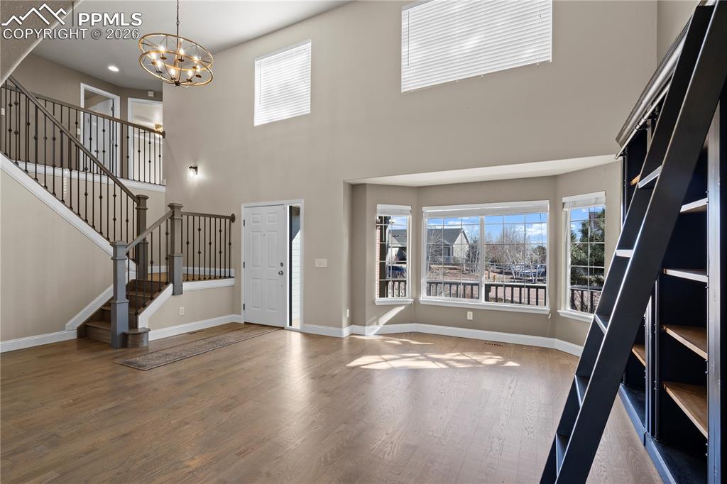 7672 Bullet Road Peyton, CO 80831 - Photo 6 of 50 Bright Living room with Vaulted Ceilings