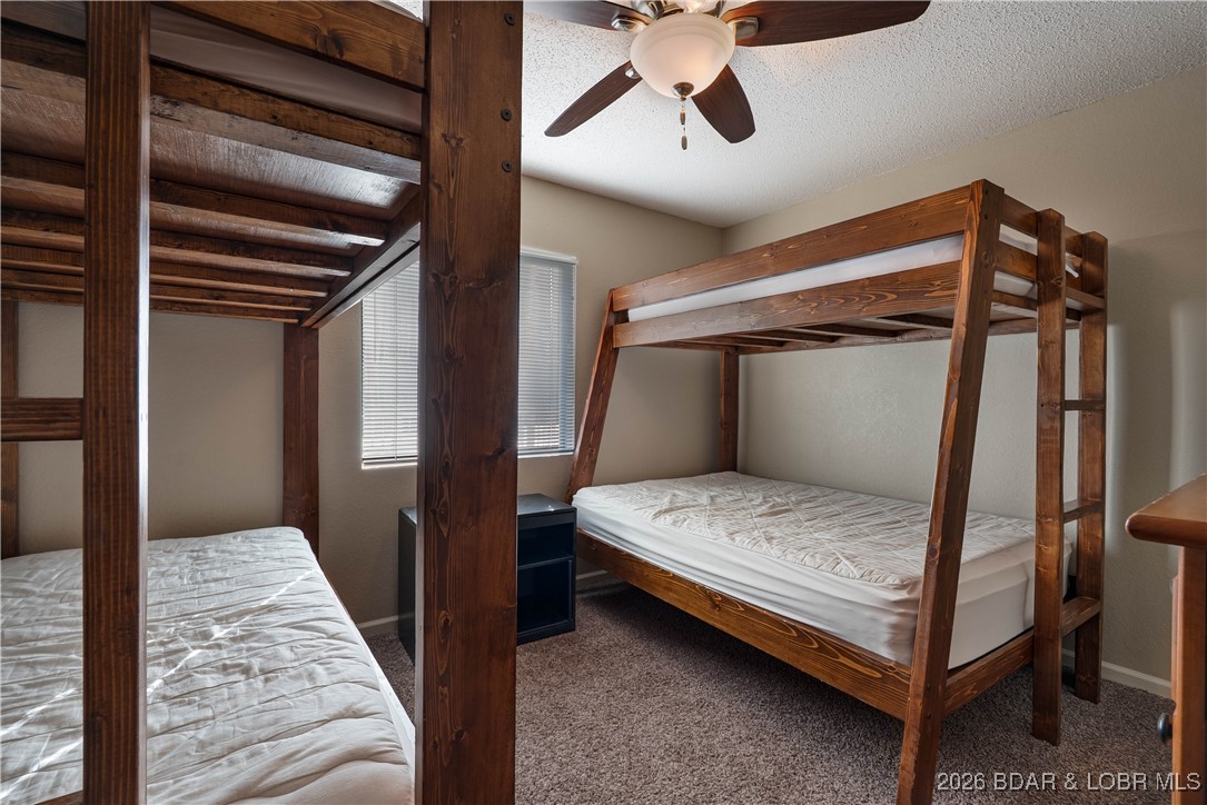 68 Branch Road, Unit 321 Lake Ozark, MO 65049 - Photo 33 of 52 Bunk room with two sets of bunk beds (twin/twin an