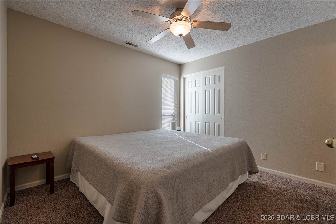 68 Branch Road, Unit 321 Lake Ozark, MO 65049 - Photo 37 of 52 Guest Bedroom with Kind bed