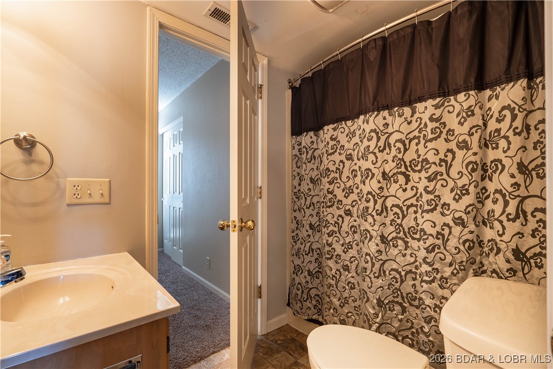 68 Branch Road, Unit 321 Lake Ozark, MO 65049 - Photo 40 of 52 Guest bathroom