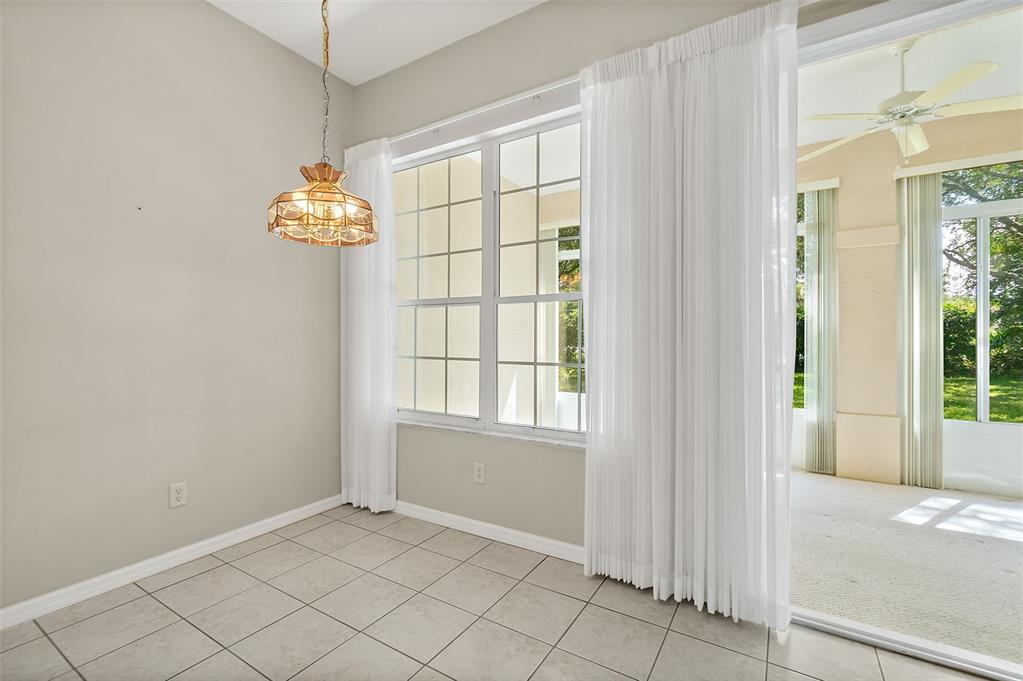 10 Chatham Place, Unit 10 Palm Coast, FL 32164 - Photo 17 of 23 an empty room with windows