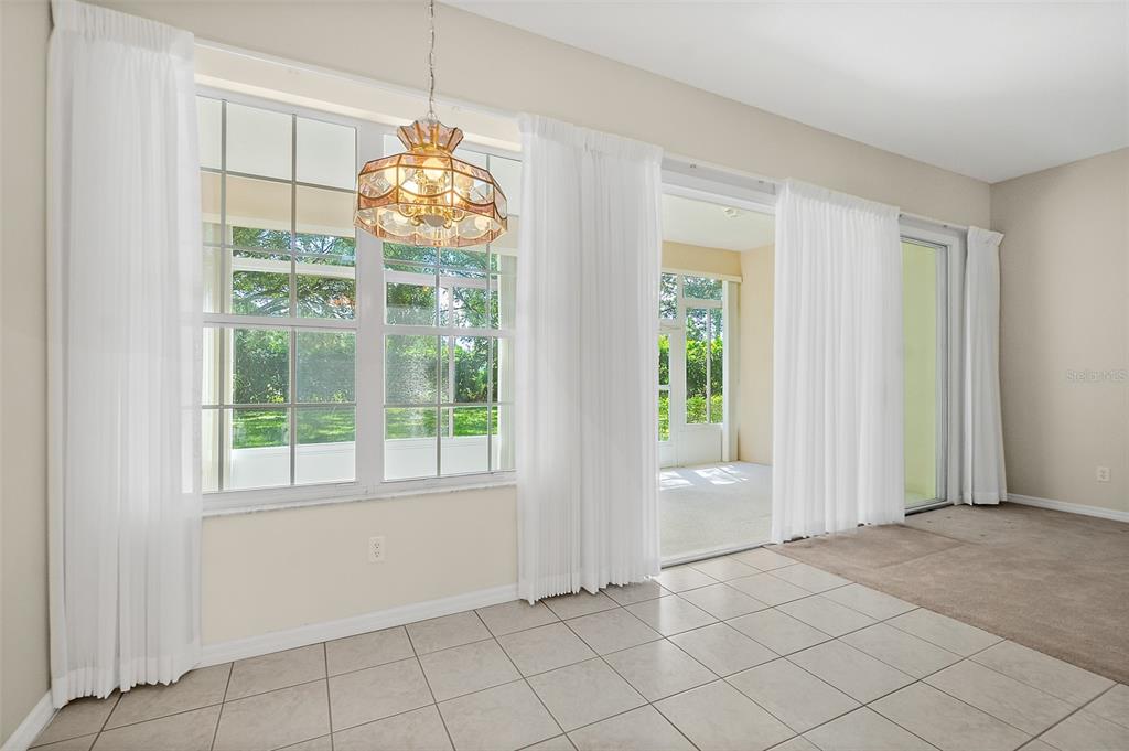10 Chatham Place, Unit 10 Palm Coast, FL 32164 - Photo 18 of 23 a view of an empty room with a window