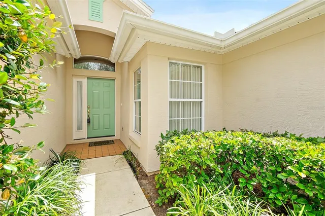 an empty room with closet and a hallway