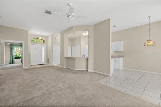 a kitchen with a sink cabinets and appliances