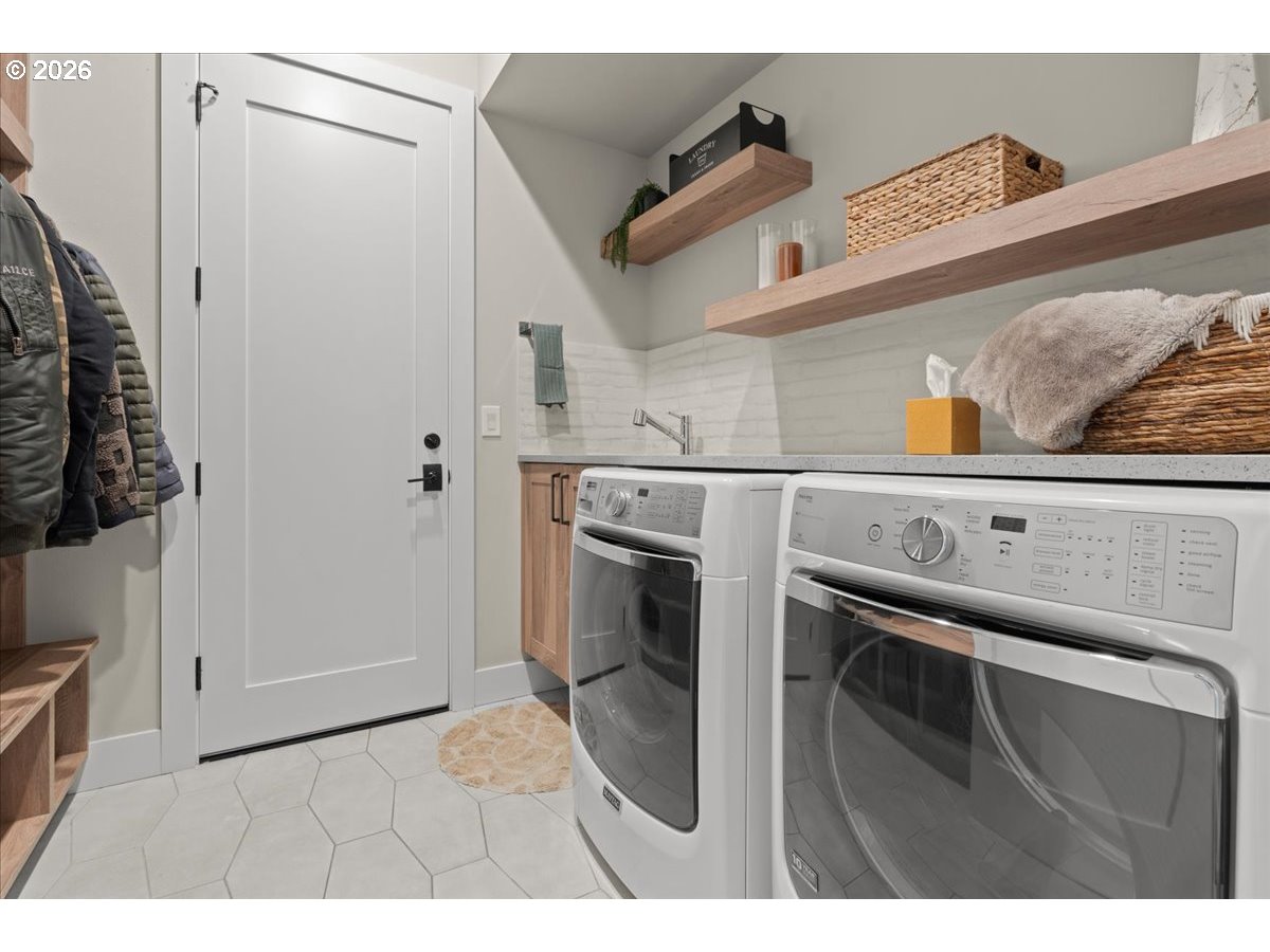 7405 Southwest 77th Avenue Portland, OR 97223 - Photo 25 of 47 a utility room with dryer and washer