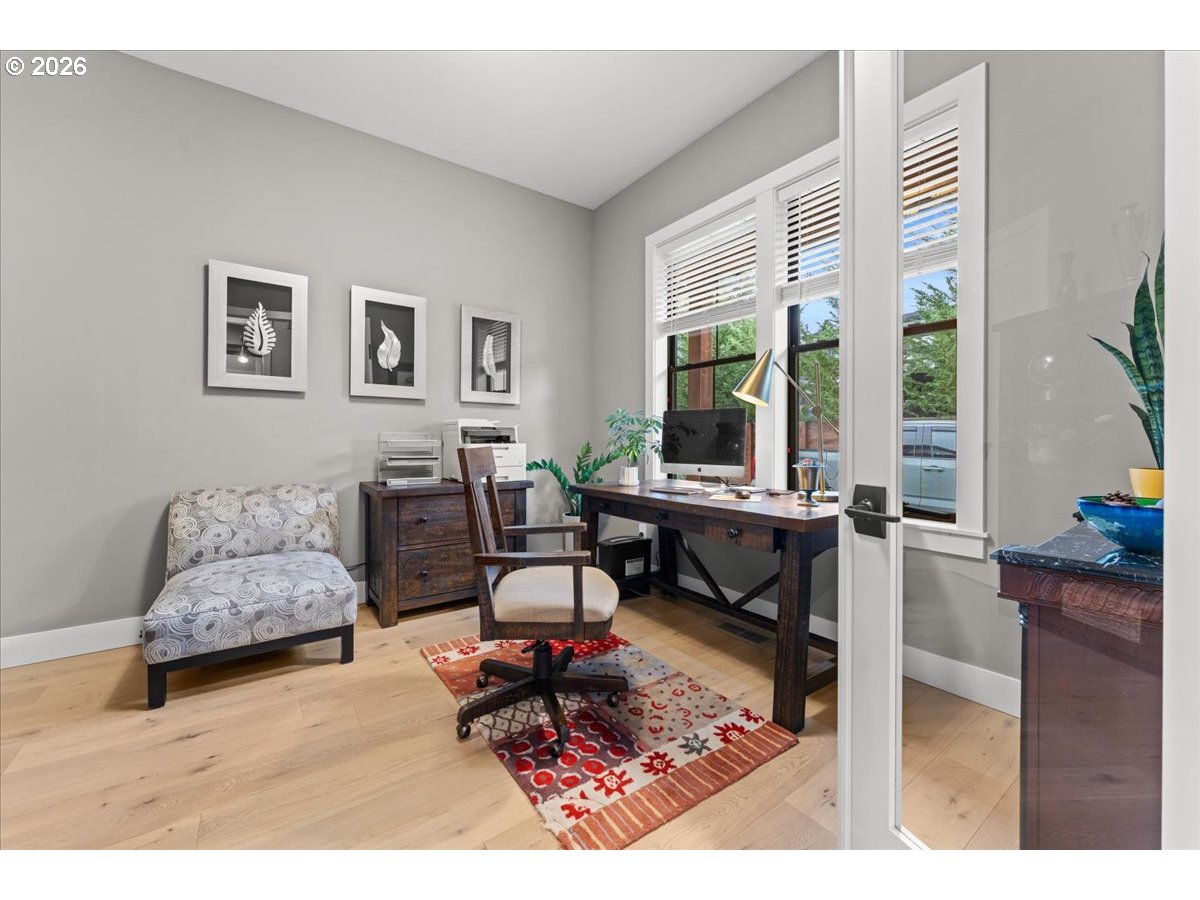 7405 Southwest 77th Avenue Portland, OR 97223 - Photo 27 of 47 a living room with furniture and a large window