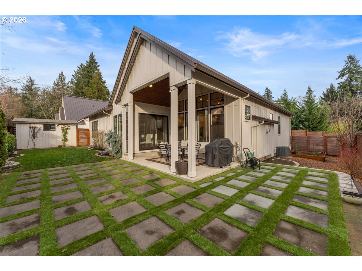 7405 Southwest 77th Avenue Portland, OR 97223 - Photo 39 of 47 a view of a house with backyard and a tree