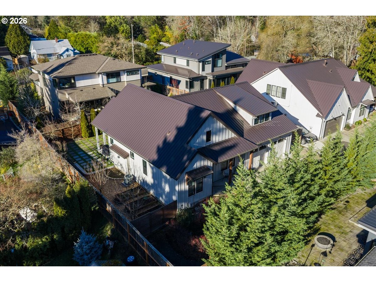 7405 Southwest 77th Avenue Portland, OR 97223 - Photo 44 of 47 an aerial view of multiple houses with a yard
