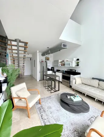 a room with furniture and a table