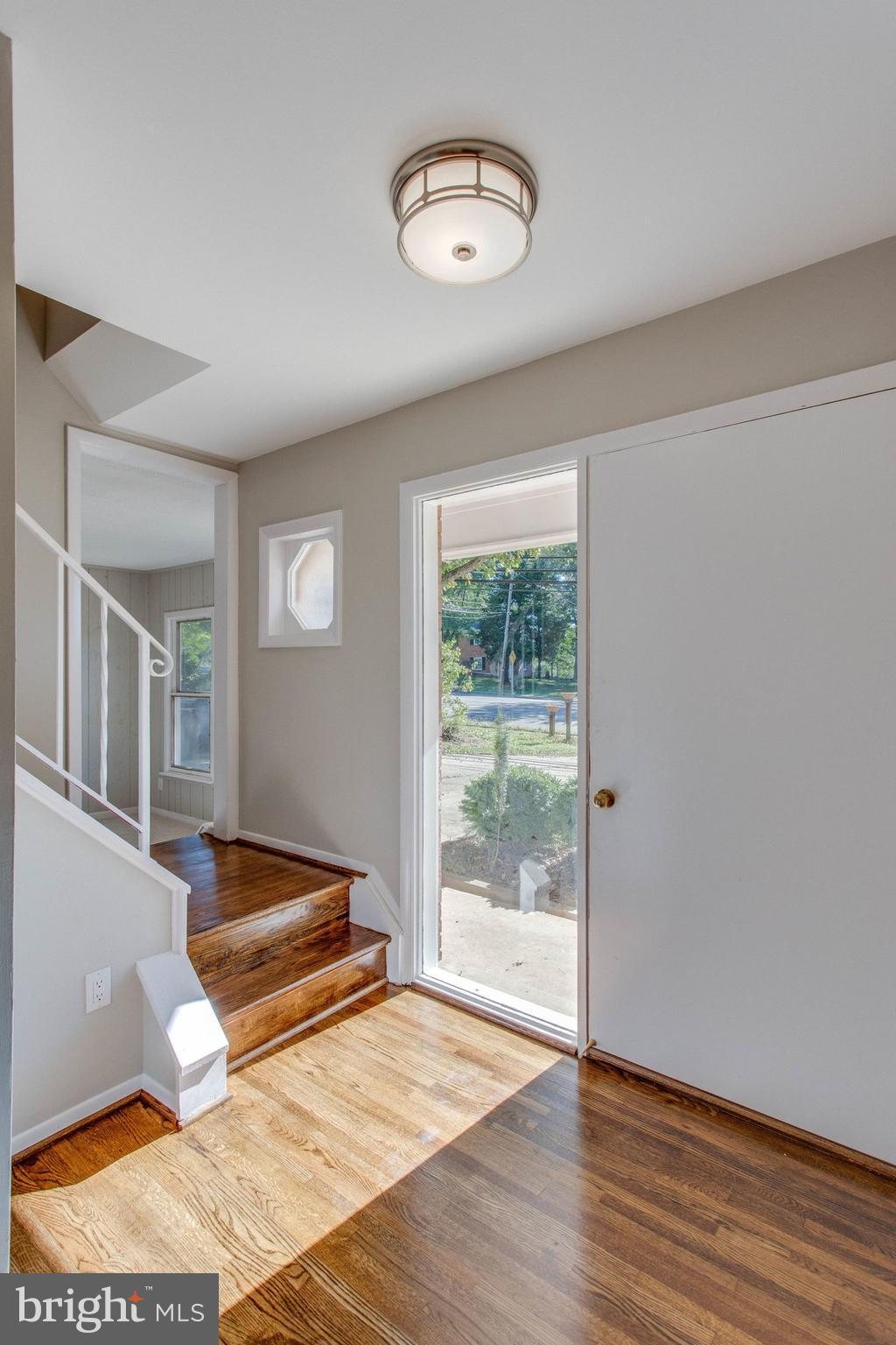 Beautiful Hardwood Foyer | New Lighting