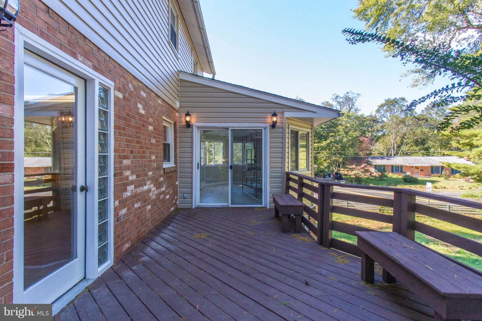 4636 Guinea Road Fairfax, VA 22032 - Photo 23 of 28 Deck off Kitchen and Sunroom