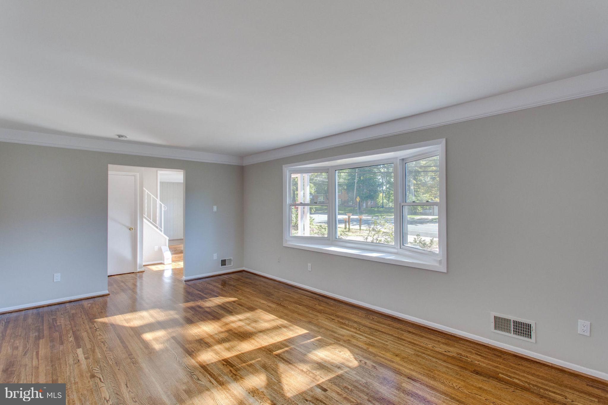 Sunny Living Room | Bay Window |  Hardwoods