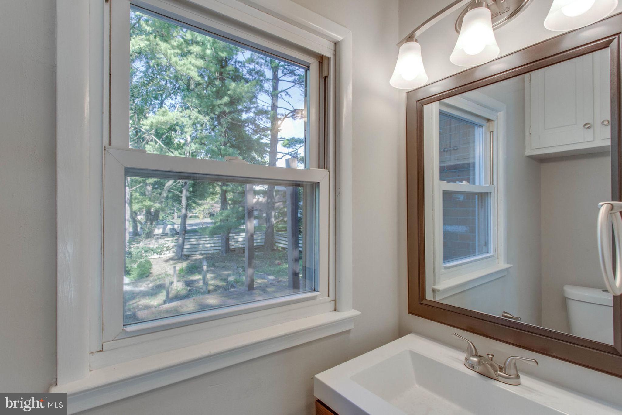 4636 Guinea Road Fairfax, VA 22032 - Photo 9 of 28 Main Level Powder Room | New Vanity & Lighting