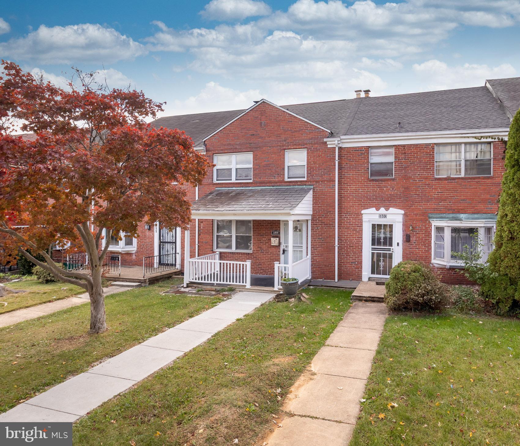 1809 Northbourne Road Baltimore, MD 21239 - Photo 1 of 43 a front view of a house with garden
