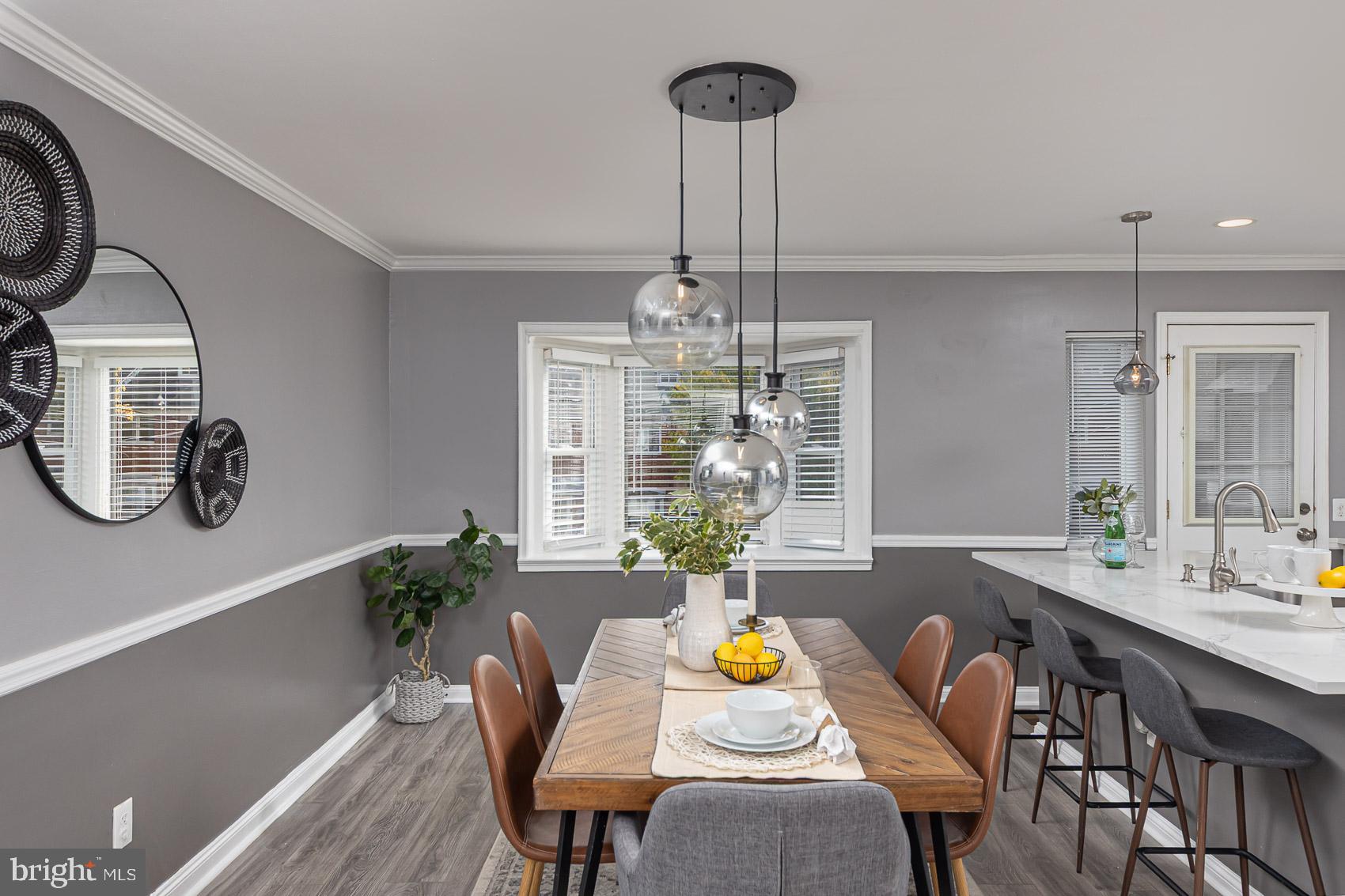 1809 Northbourne Road Baltimore, MD 21239 - Photo 12 of 43 a view of a dining room with furniture window and wooden floor