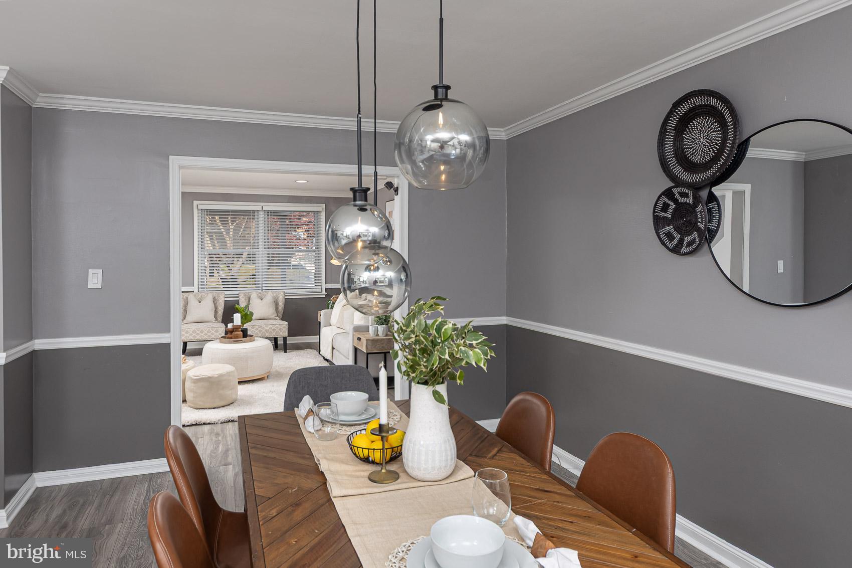 1809 Northbourne Road Baltimore, MD 21239 - Photo 14 of 43 a dining room with furniture and wooden floor