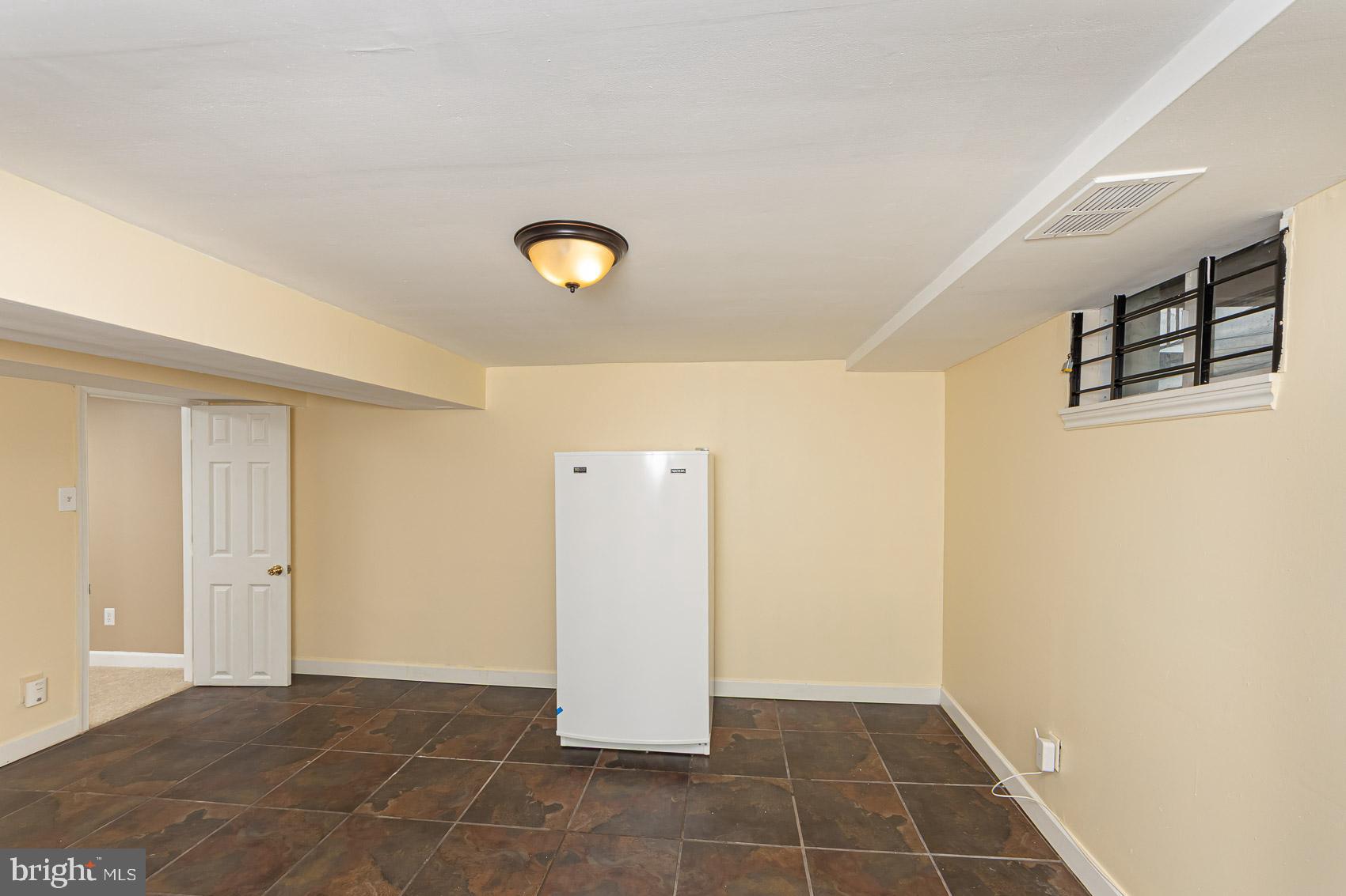 1809 Northbourne Road Baltimore, MD 21239 - Photo 31 of 43 a view of an empty room