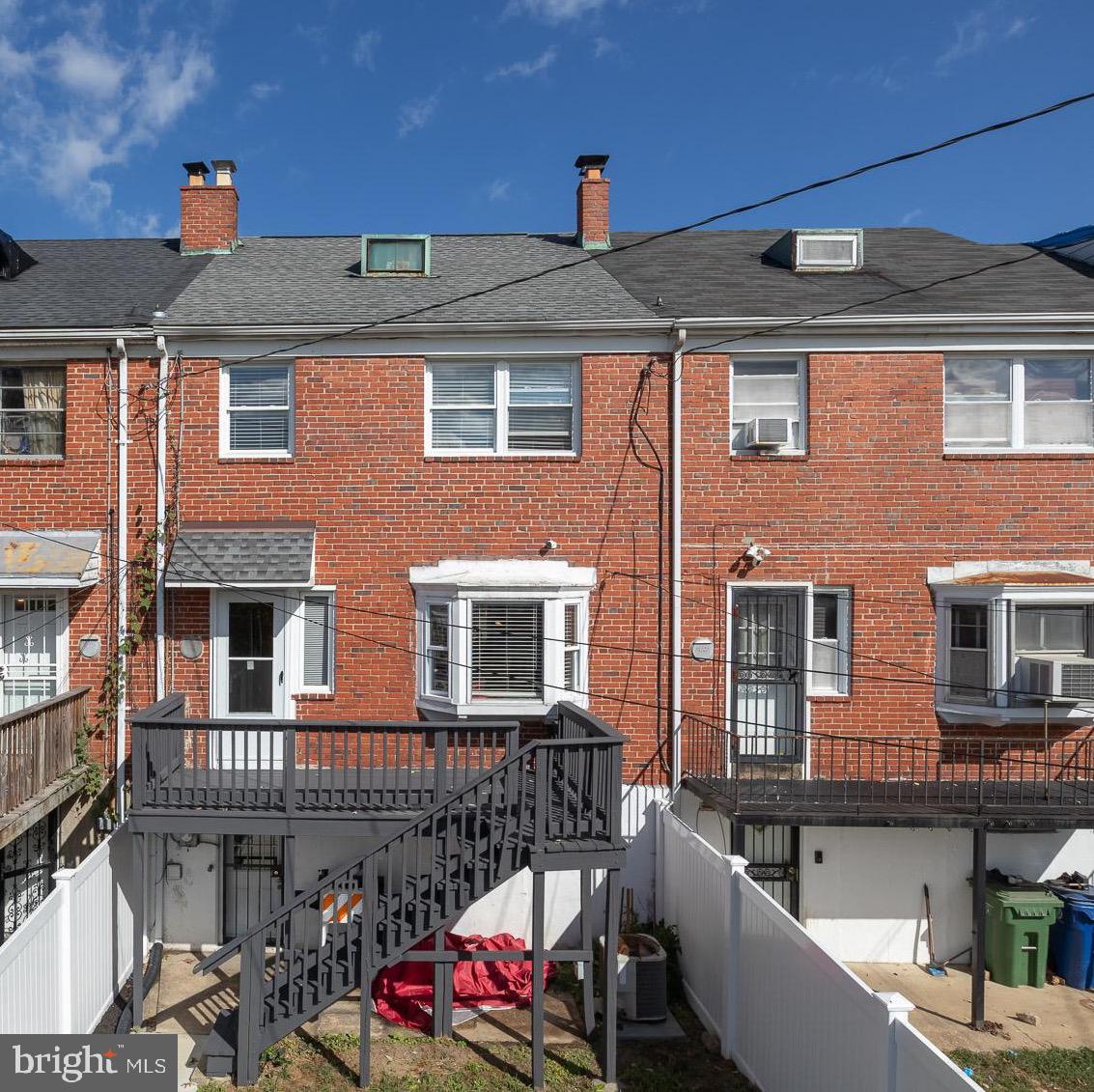 1809 Northbourne Road Baltimore, MD 21239 - Photo 40 of 43 a front view of a house with balcony