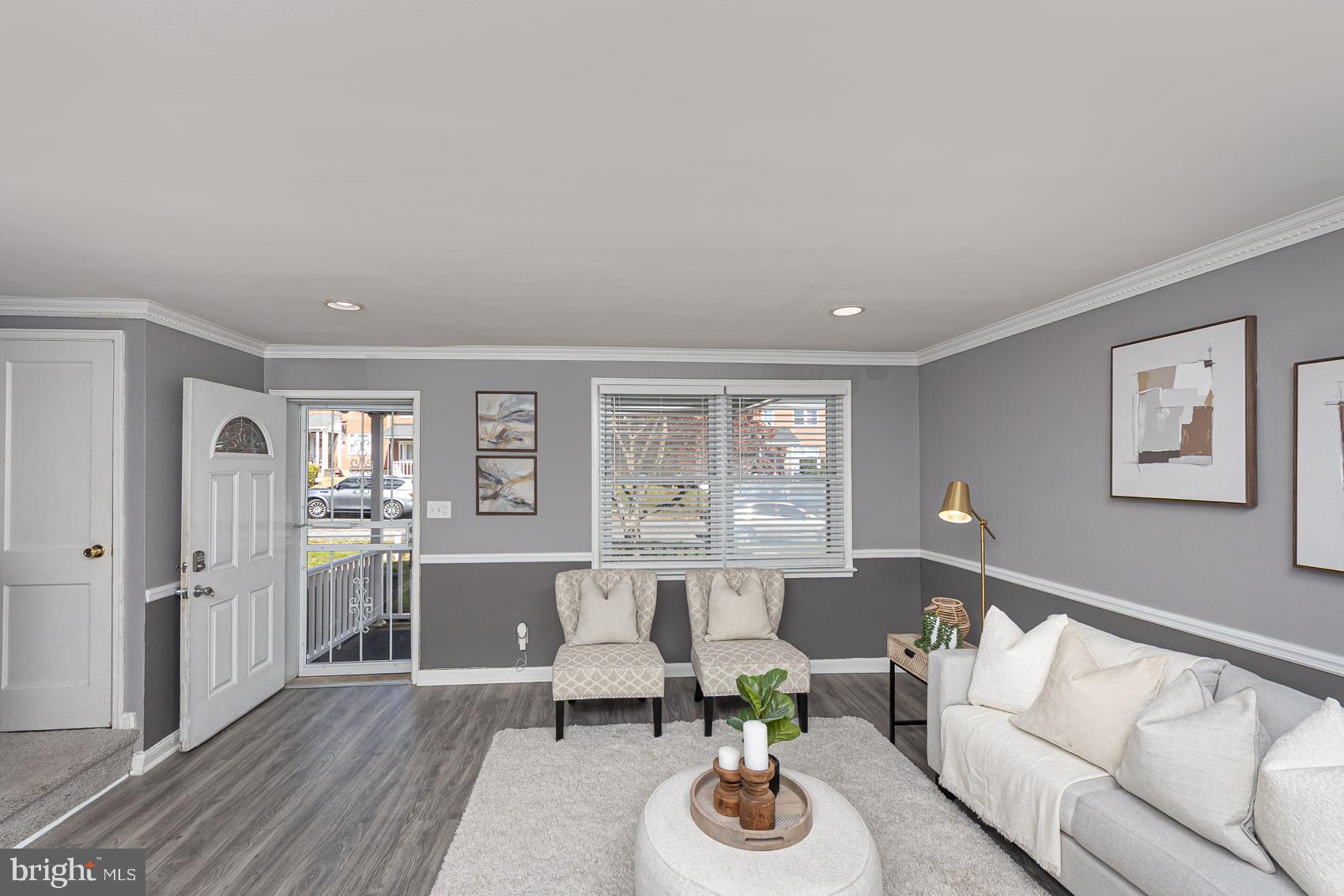 1809 Northbourne Road Baltimore, MD 21239 - Photo 4 of 43 a living room with furniture and wooden floor