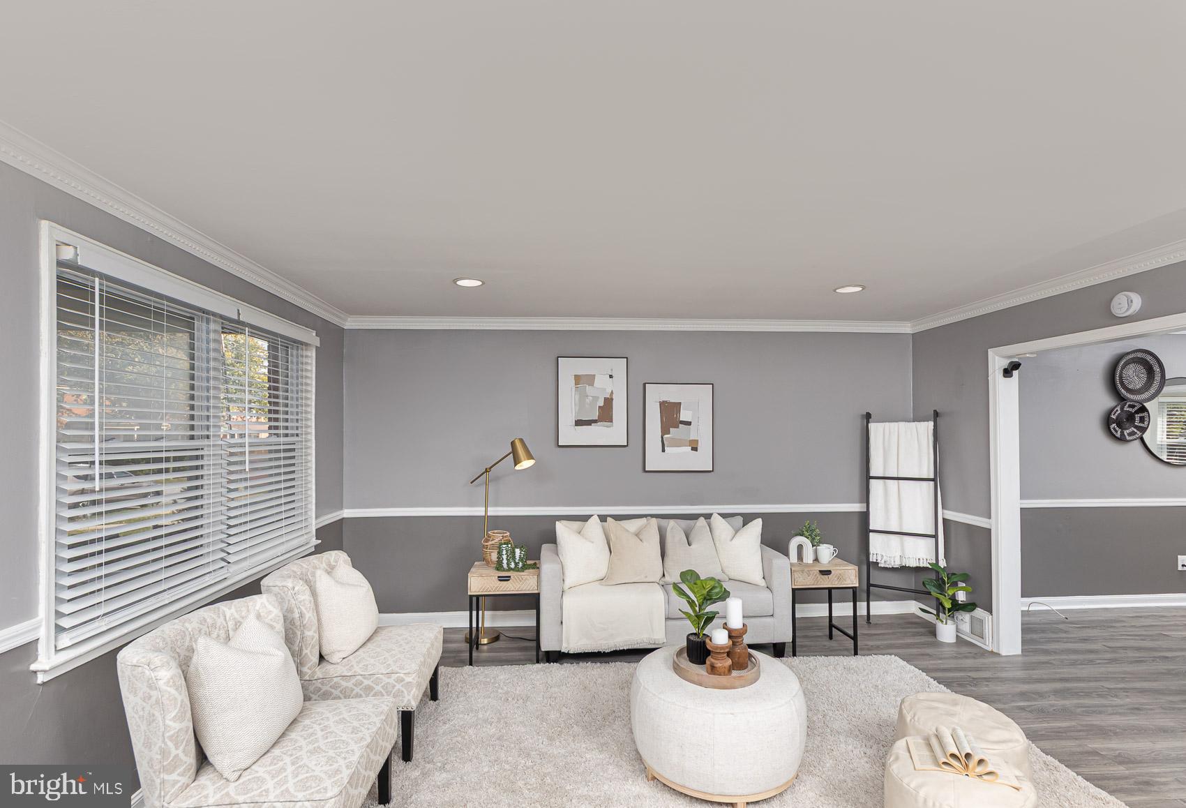 1809 Northbourne Road Baltimore, MD 21239 - Photo 6 of 43 a living room with furniture and window