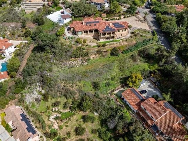 a view of swimming pool from a balcony