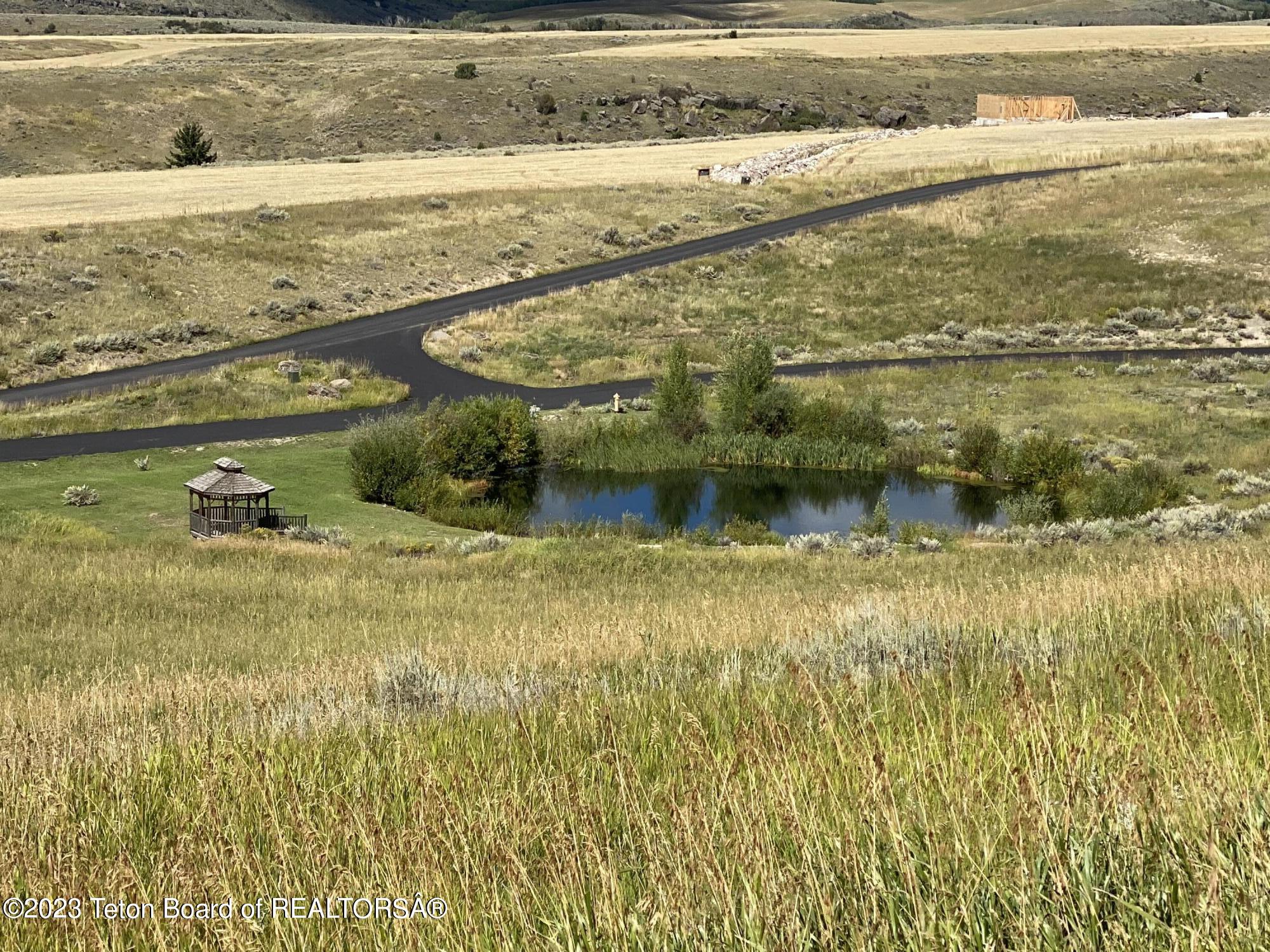 2633 Spring Hollow Ranch Road Tetonia, ID 83452 - Photo 18 of 18 Fusi - View from build site to pond