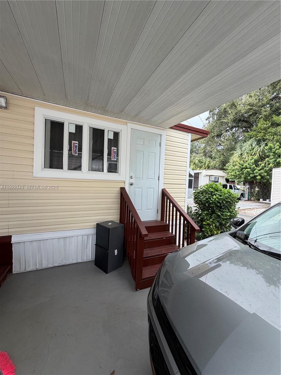 2980 Northwest 79th Street, Unit C Miami, FL 33147 - Photo 1 of 5 a outdoor space with furniture
