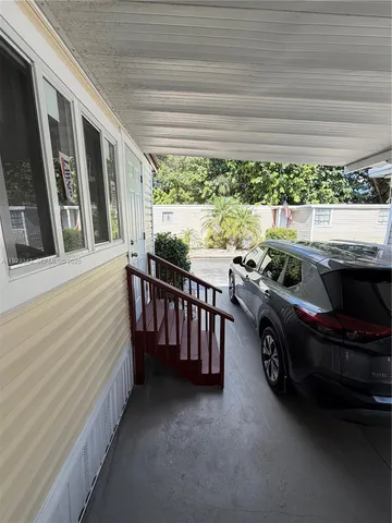 a car parked in front of a house