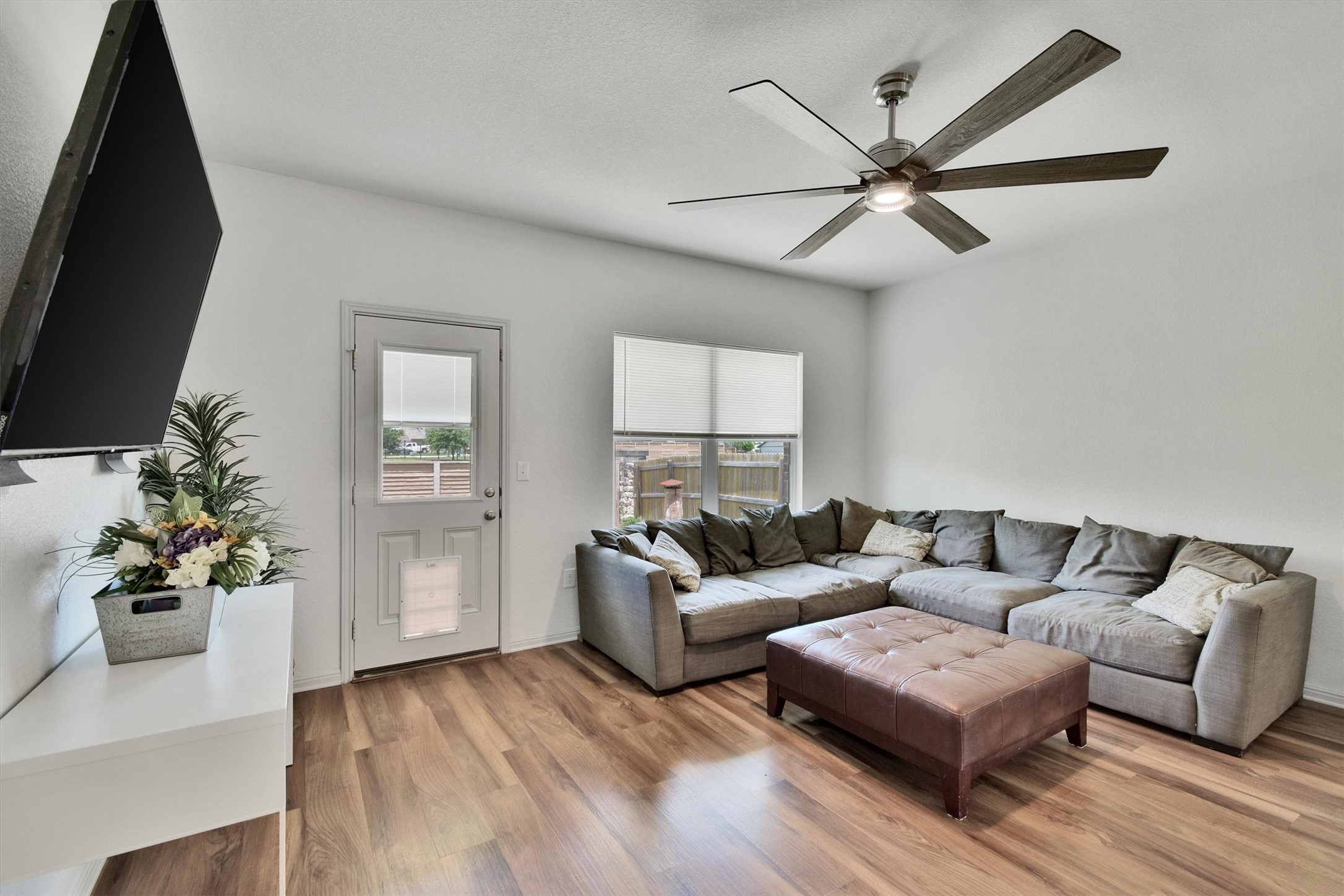 324 Shiner Lane Georgetown, TX 78626 - Photo 9 of 39 a living room with furniture and a flat screen tv