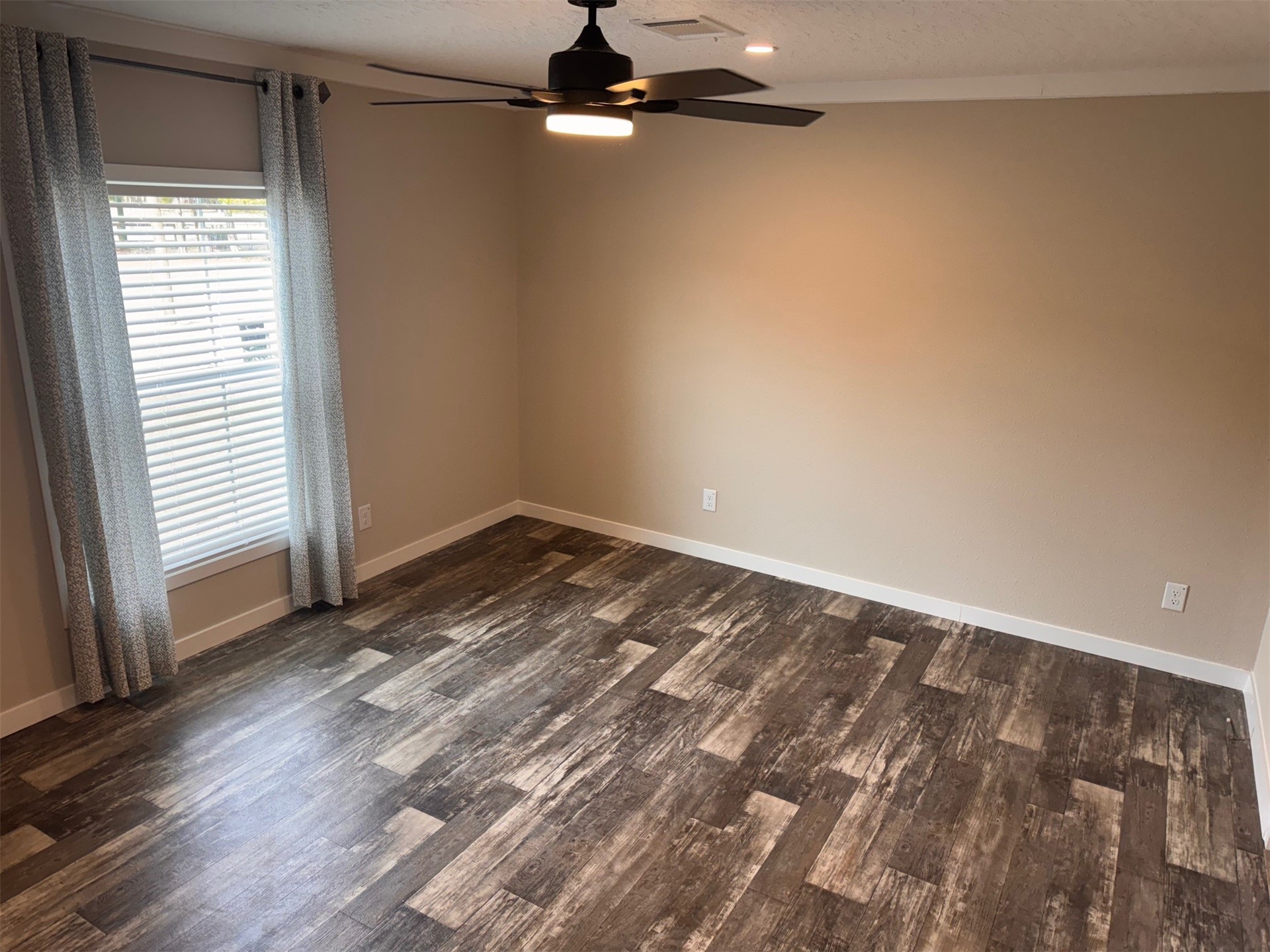 273535 Murrhee Road Hilliard, FL 32046 - Photo 14 of 25 a view of a room with wooden floor and a window