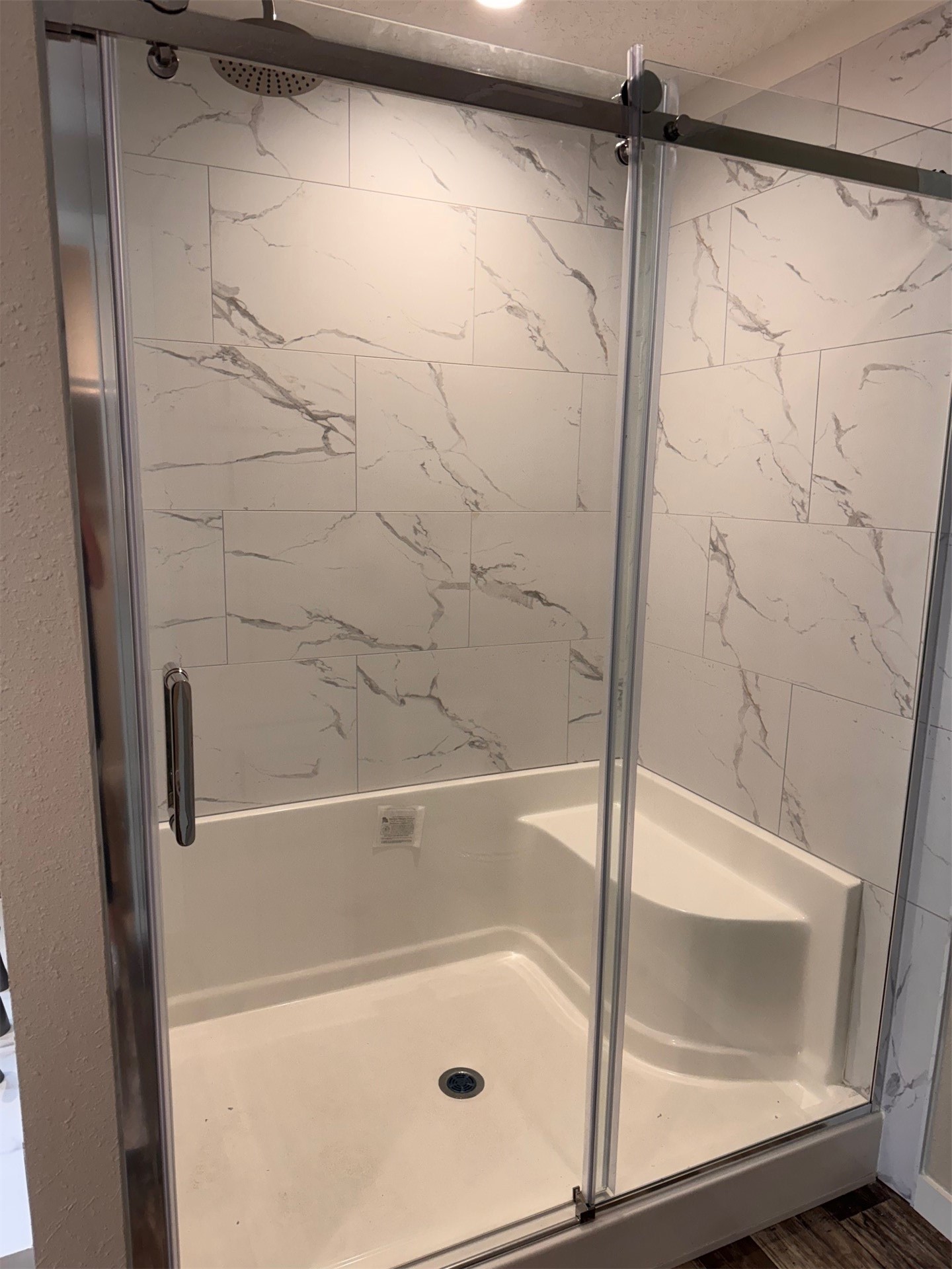 273535 Murrhee Road Hilliard, FL 32046 - Photo 17 of 25 a bathroom with a glass shower door